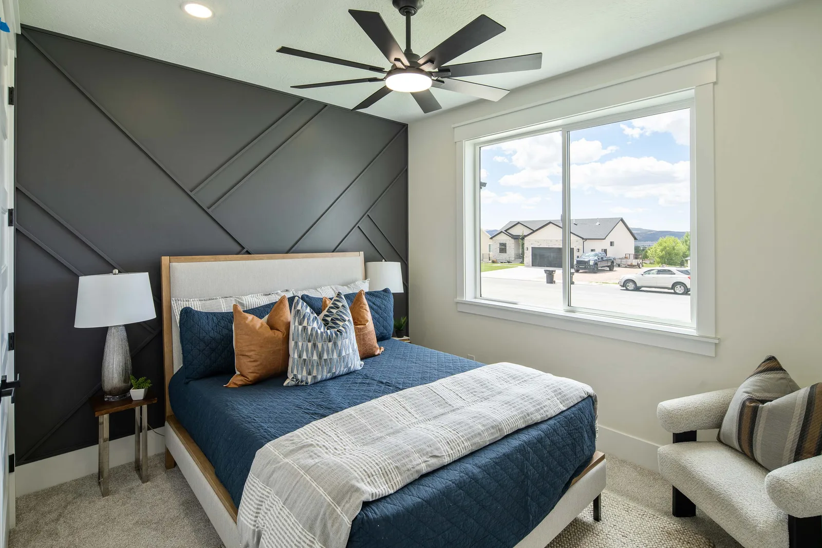 Charcoal geometric wall and navy bedding