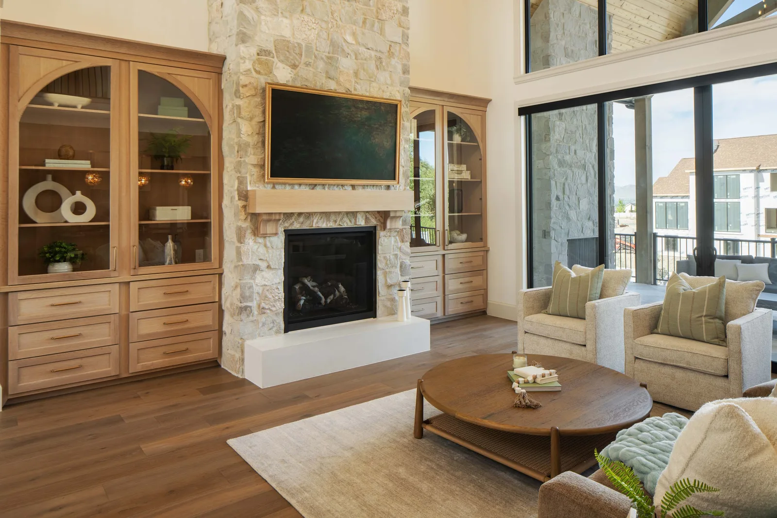 Stone fireplace, oak cabinets