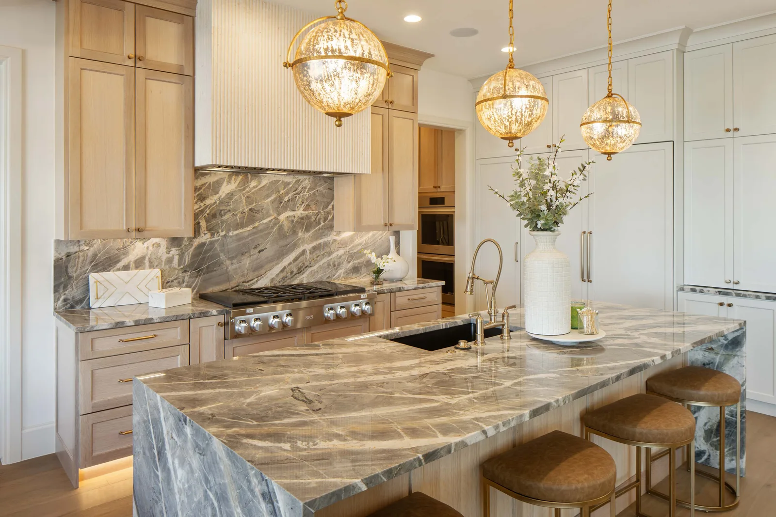 Veined marble and mercury-glass globes