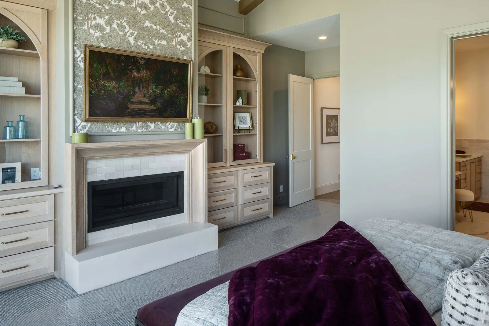 Framed Monet over a tiled hearth