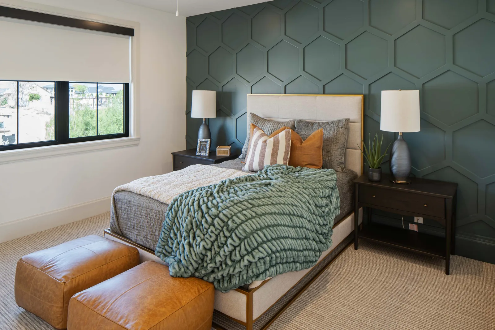 Green hexagon-paneled headboard wall