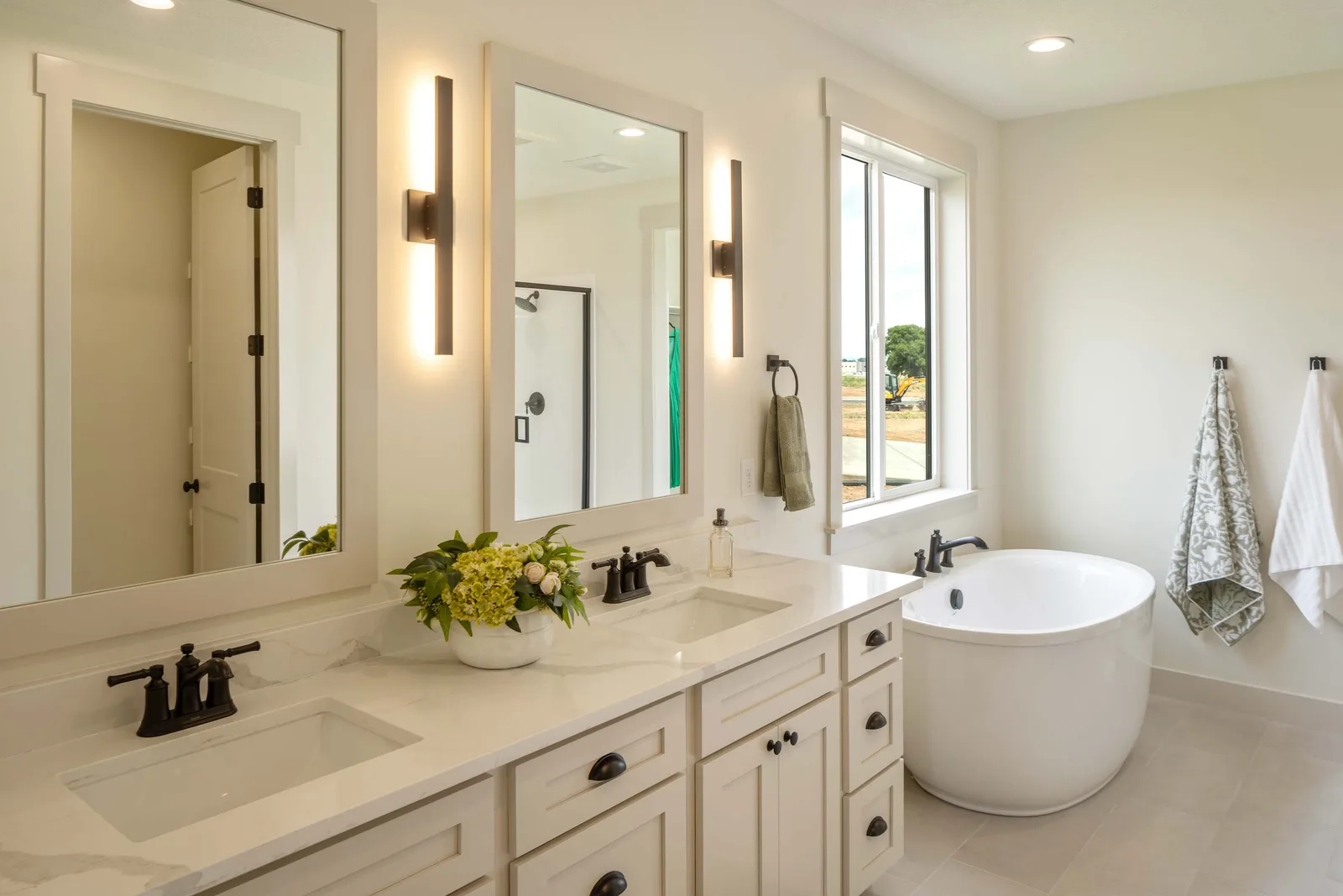 Double vanity and a soaking tub