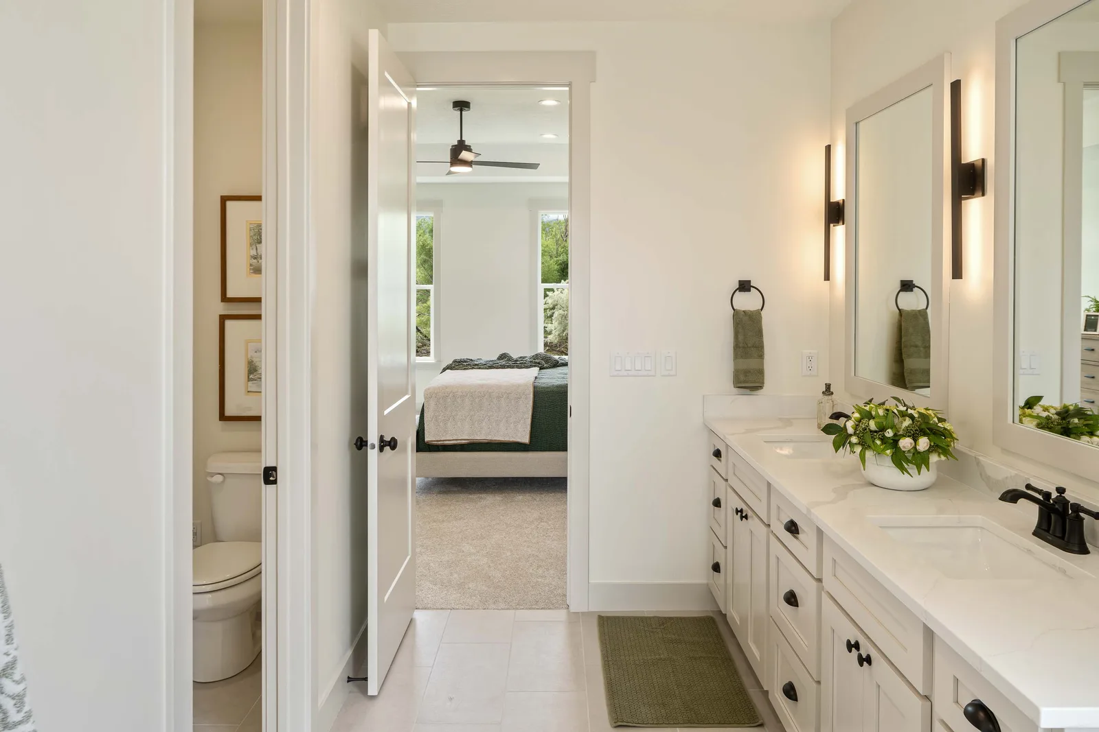 Vanity to bedroom view