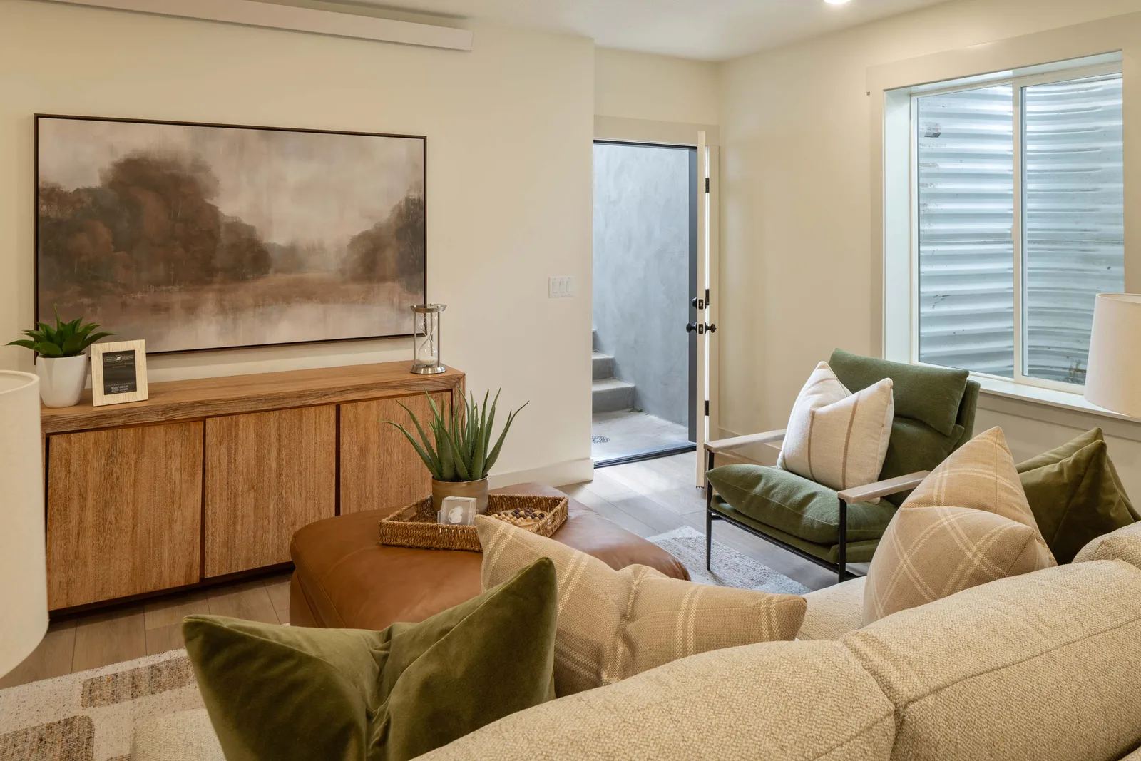 Sectional and green chair