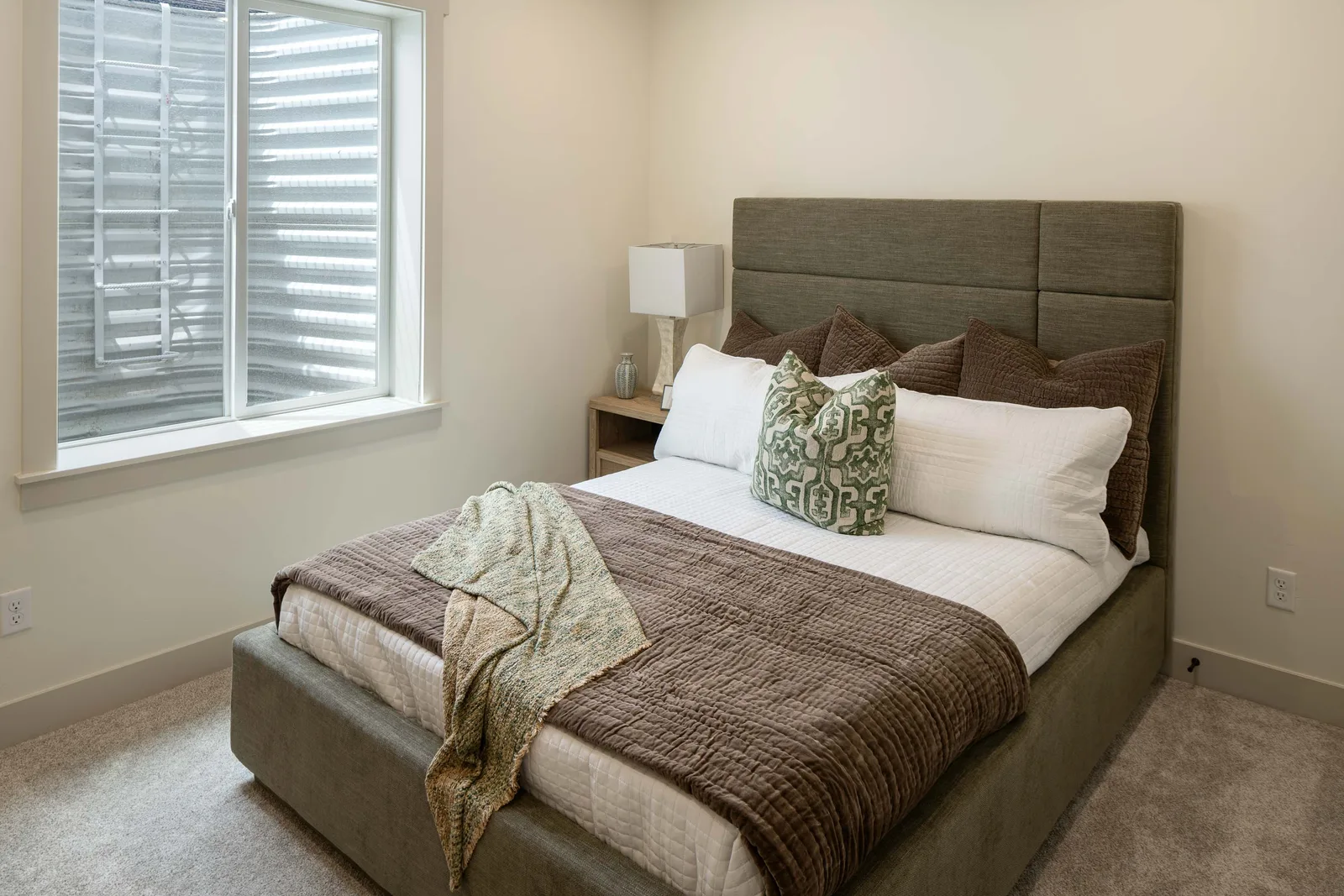 Gray upholstered bed