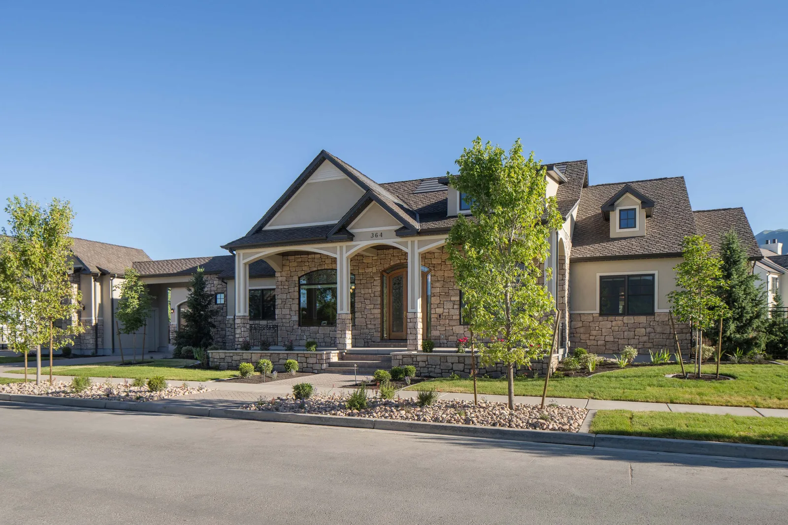 Stone and stucco craftsman front