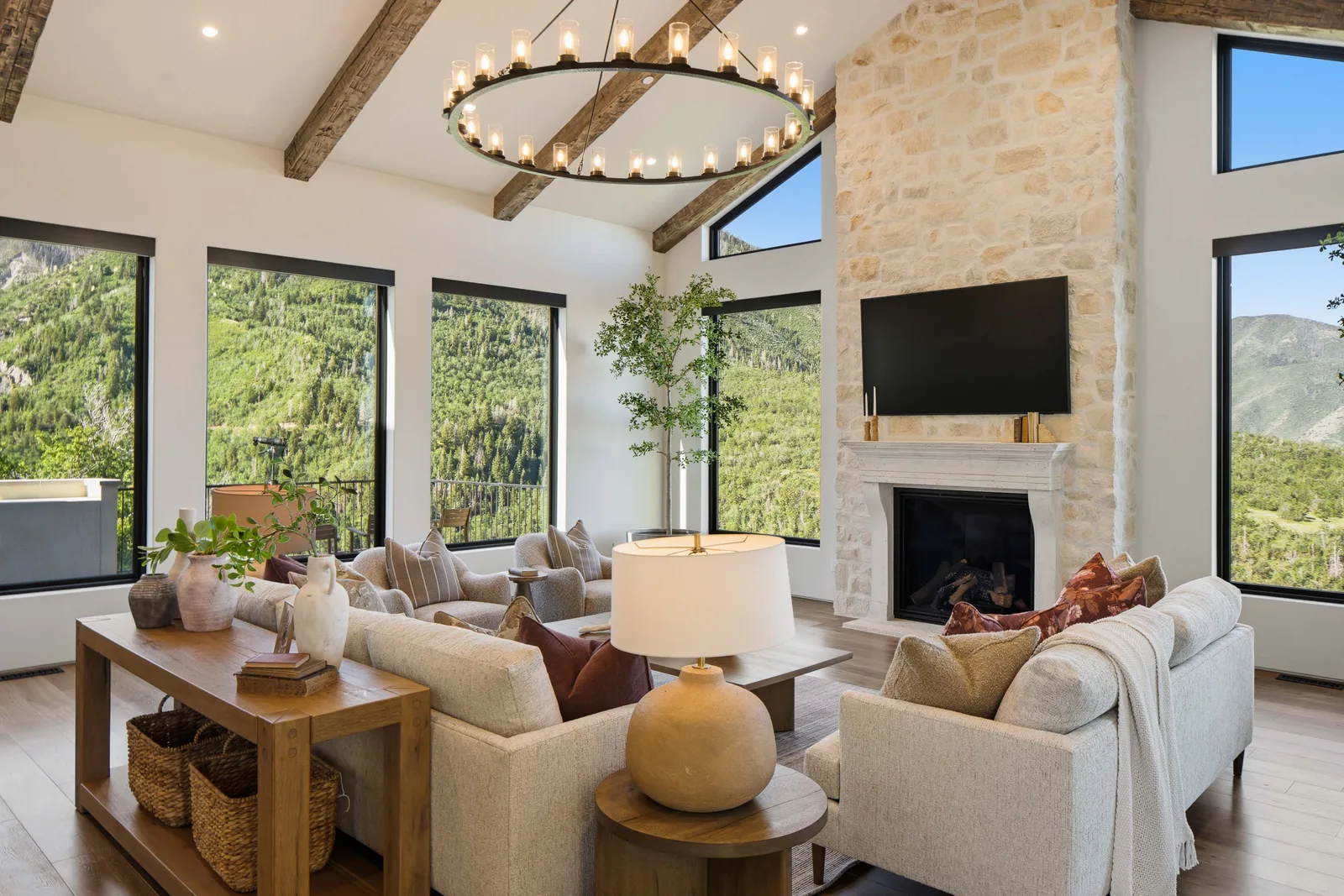 Two sofas under an iron ring of light