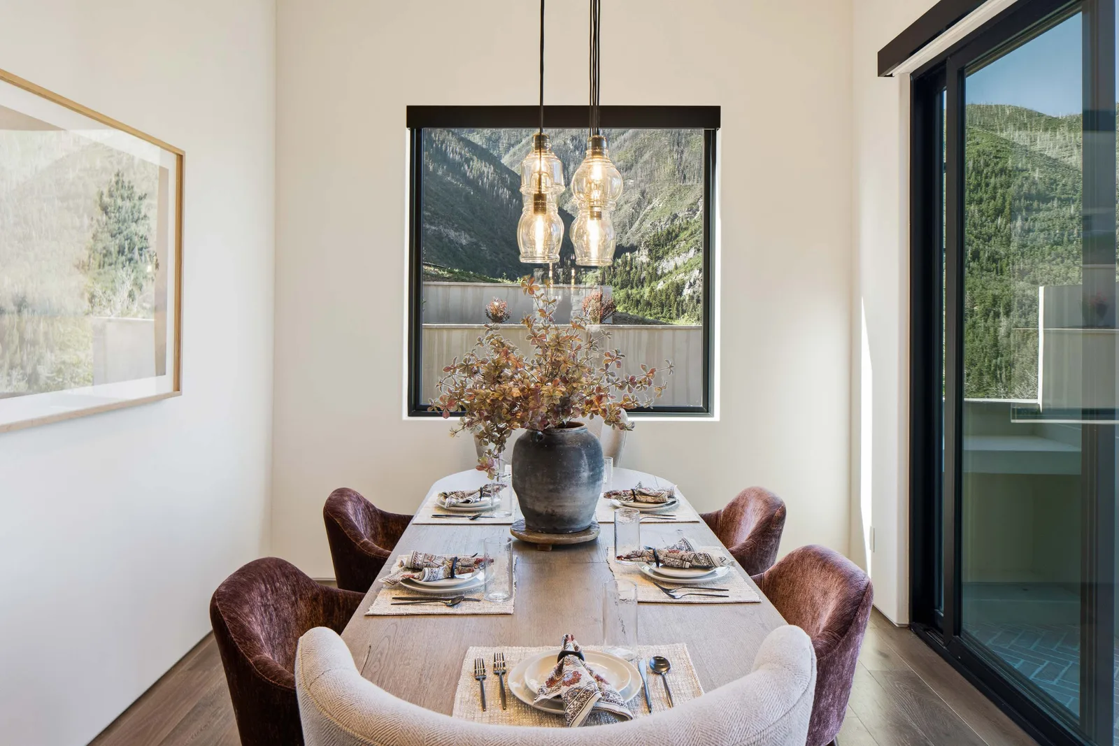 Leather chairs at a live-edge table